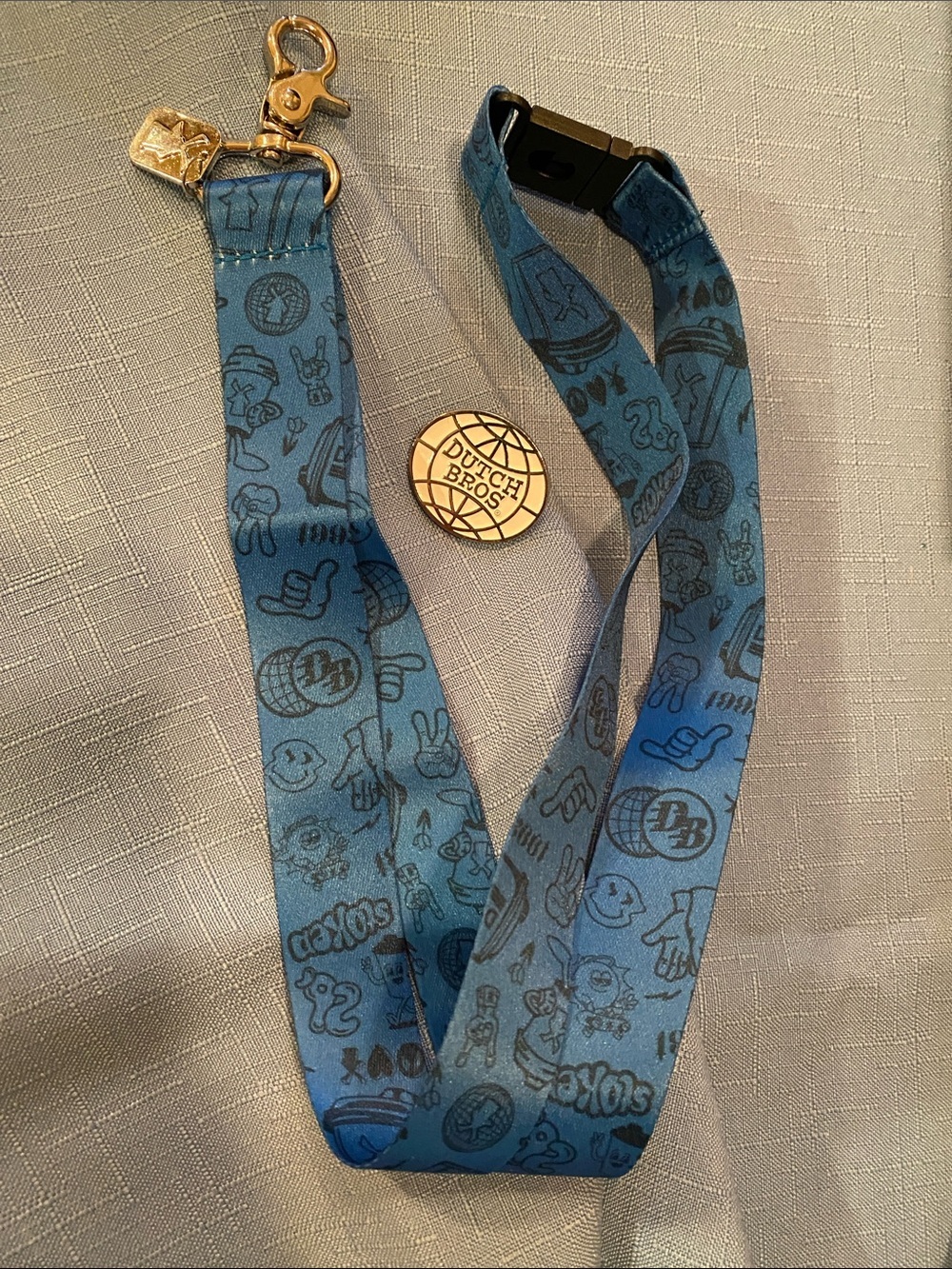 Dutch Bros blue lanyard and pin set